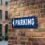 Panneau Parking flèche gauche directionnelle en aluminium