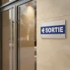 Panneau signalétique Sortie à gauche – sécurité bâtiment