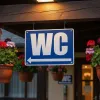 Panneau WC direction gauche – Panneau toilettes