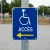 Panneau accès à gauche handicapé – Panneau handicapé - PMR
