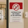 Interdiction de fumer et de vapoter — hall, à côté de la porte vitrée